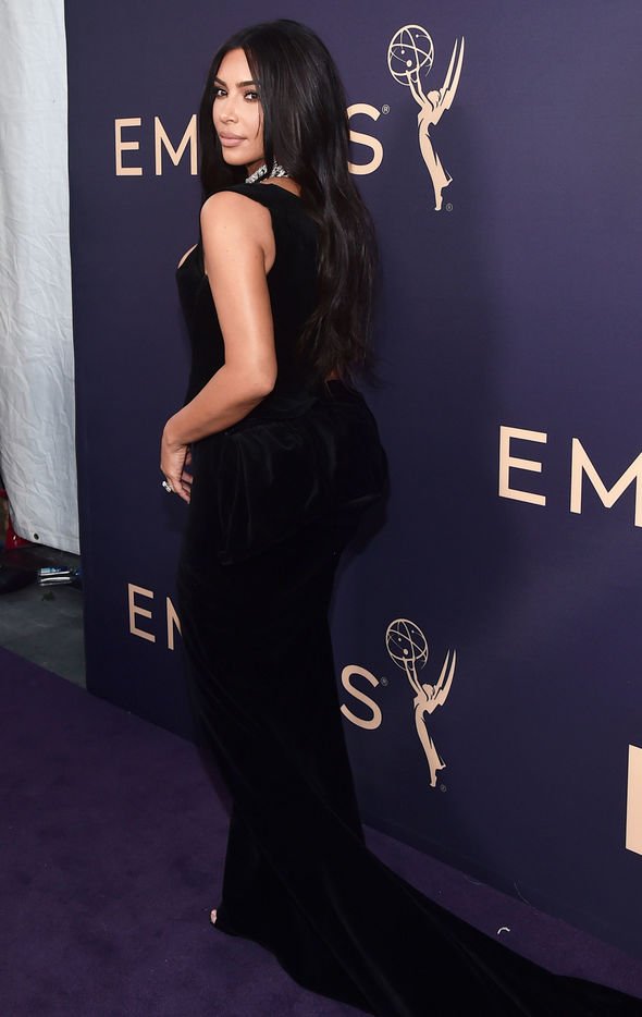 Kim-Kardashian-showcased-her-sensational-physique-in-a-tight-black-dress-at-the-Emmy-Awards-2019-2072010.jpg